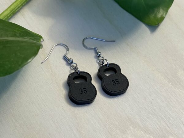 Matte black acrylic kettlebell dangle earrings