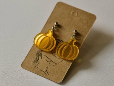 Shimmery orange pumpkin dangle earrings